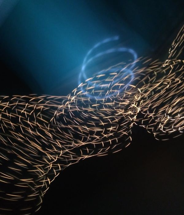 Abstract glowing lines representing digital relaxation and focus